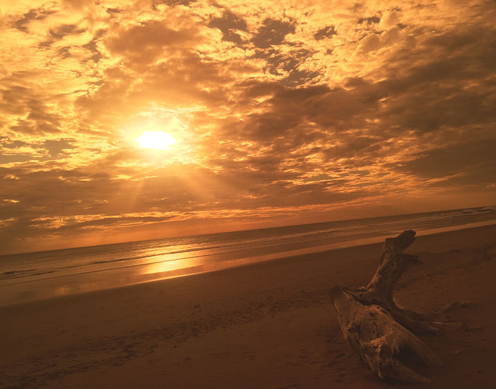 Sunset through Bambuddha's lens. Polarized view of beach in Nicaragua.